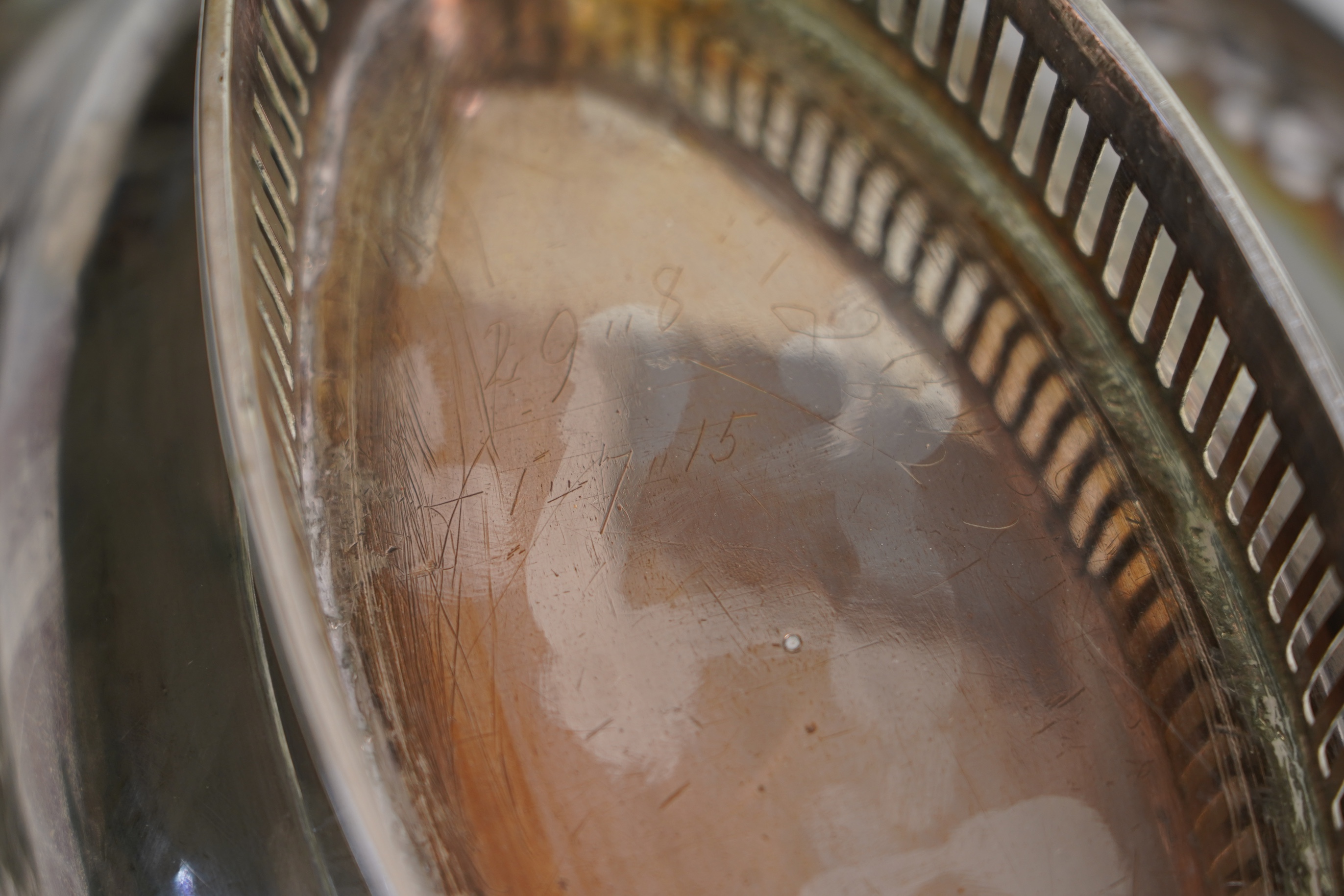 A George III silver oval cake basket, by William Allen III